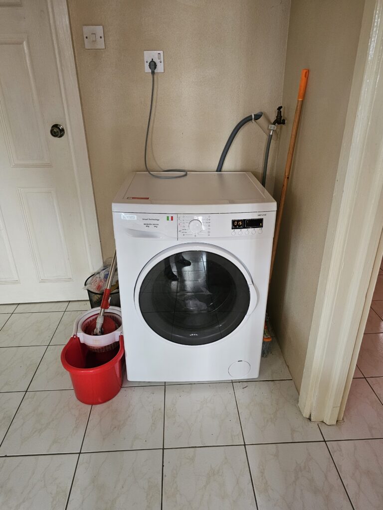 Washing machine, laundry and cleaning area